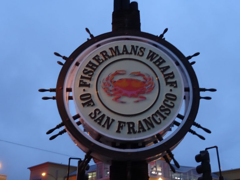 fishermans wharf sign at night