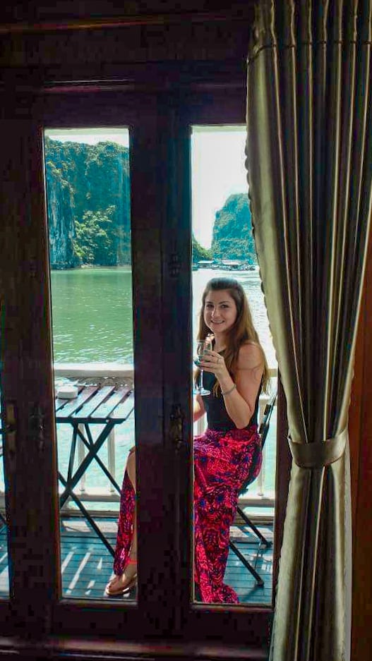 me on balcony halong bay cruise