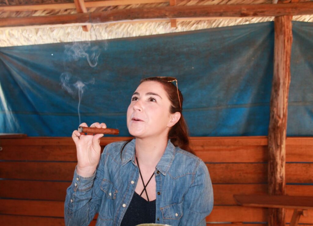 lady smoking a cigar vinales cuba